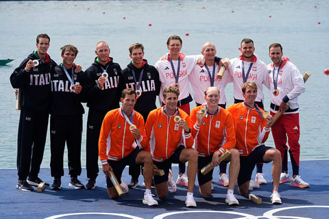 Men's quadruple sculls rowing: Silver medalists, back left, Italy, gold medalists, front center, Netherland's and bronze medalists Poland